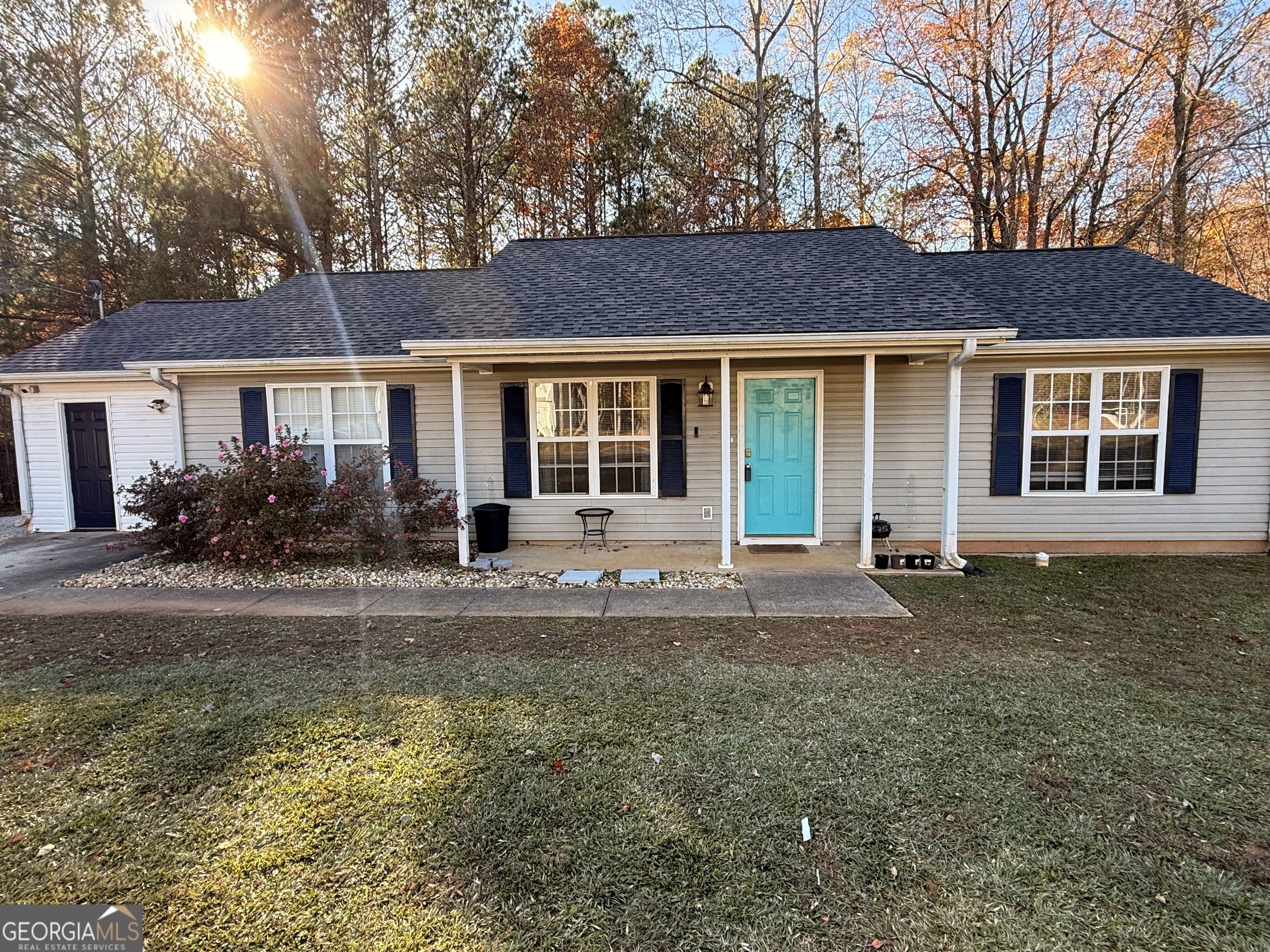 front view of a house with a yard