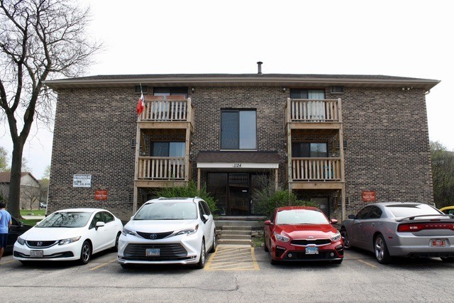 a car parked in front of a building