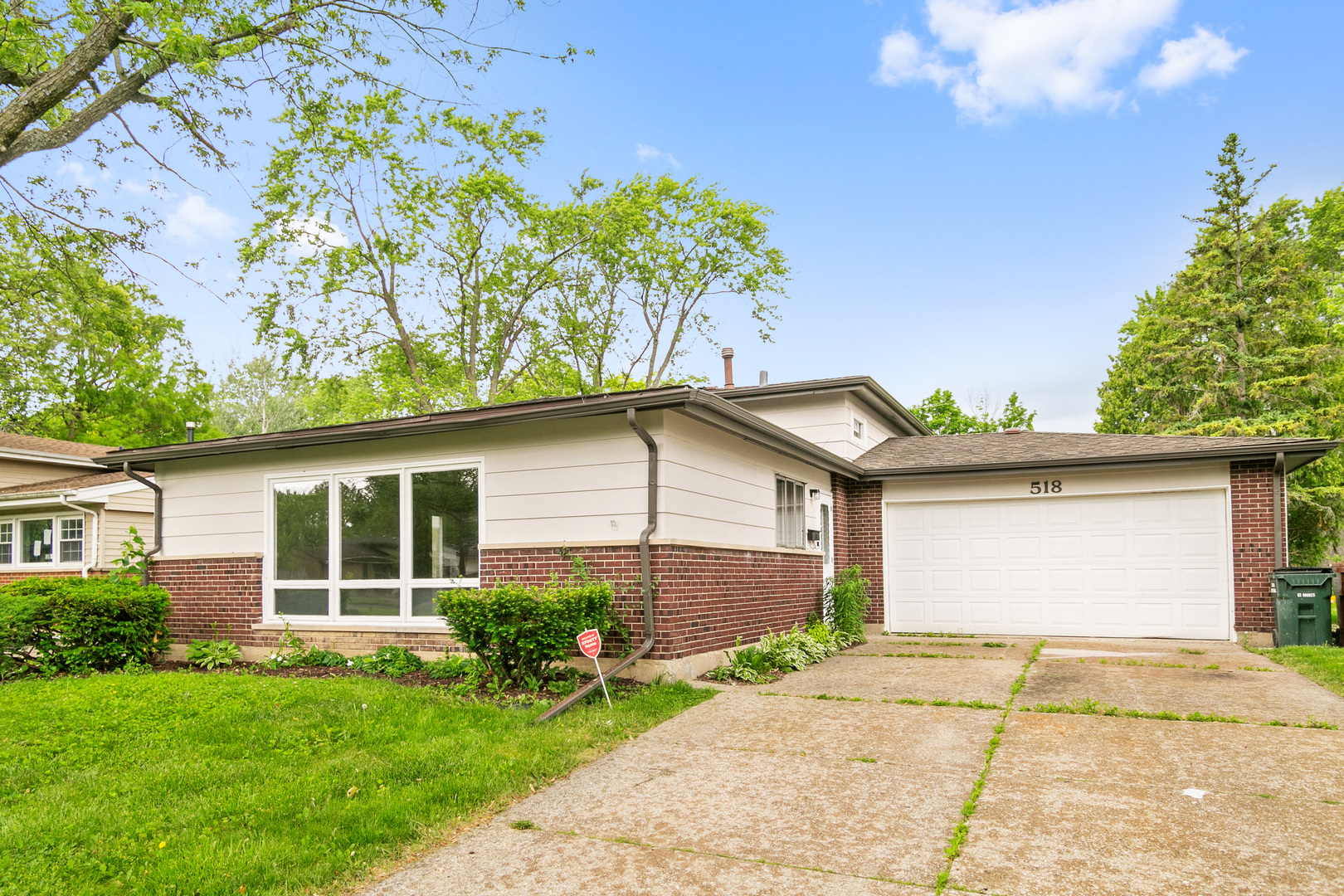 a house view with a backyard space