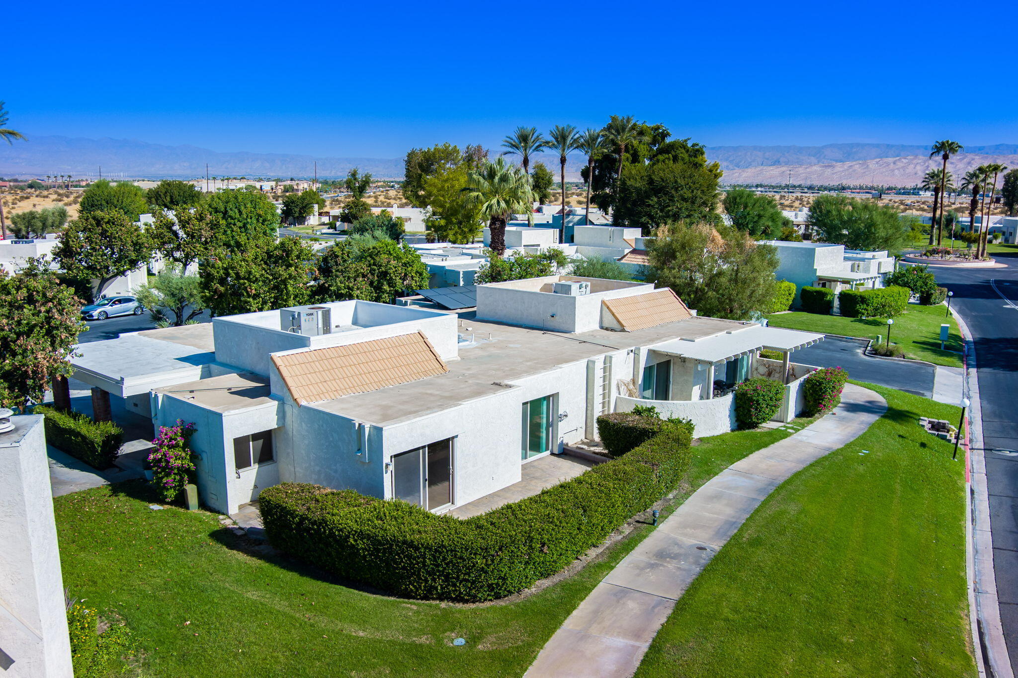 a view of a house with a big yard