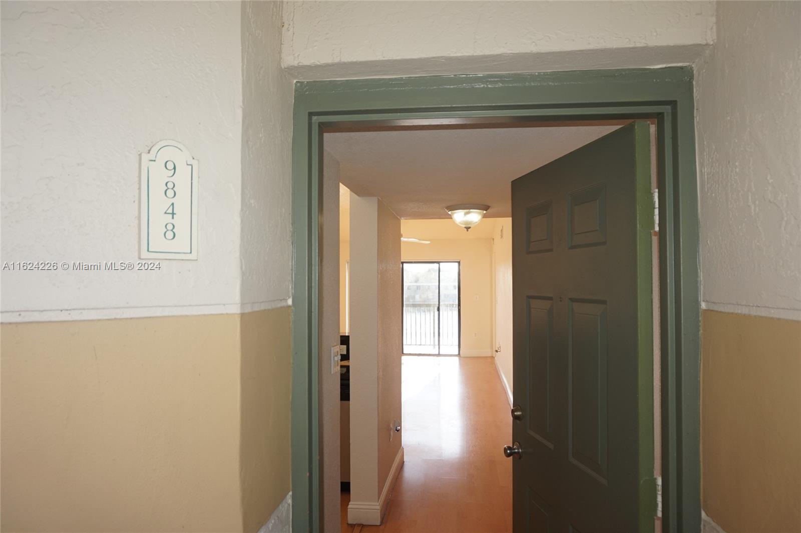 a view of hallway with stairs