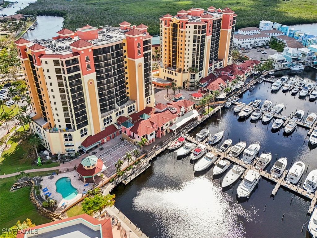 an aerial view of a city with lawn chairs