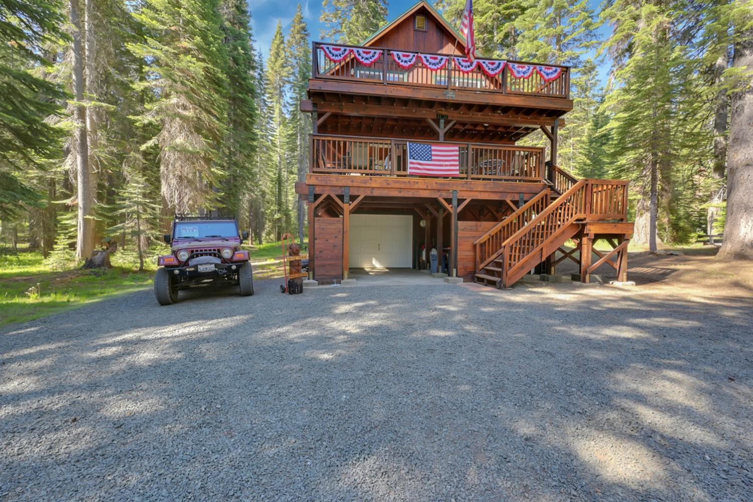 a view of a car park in front of house