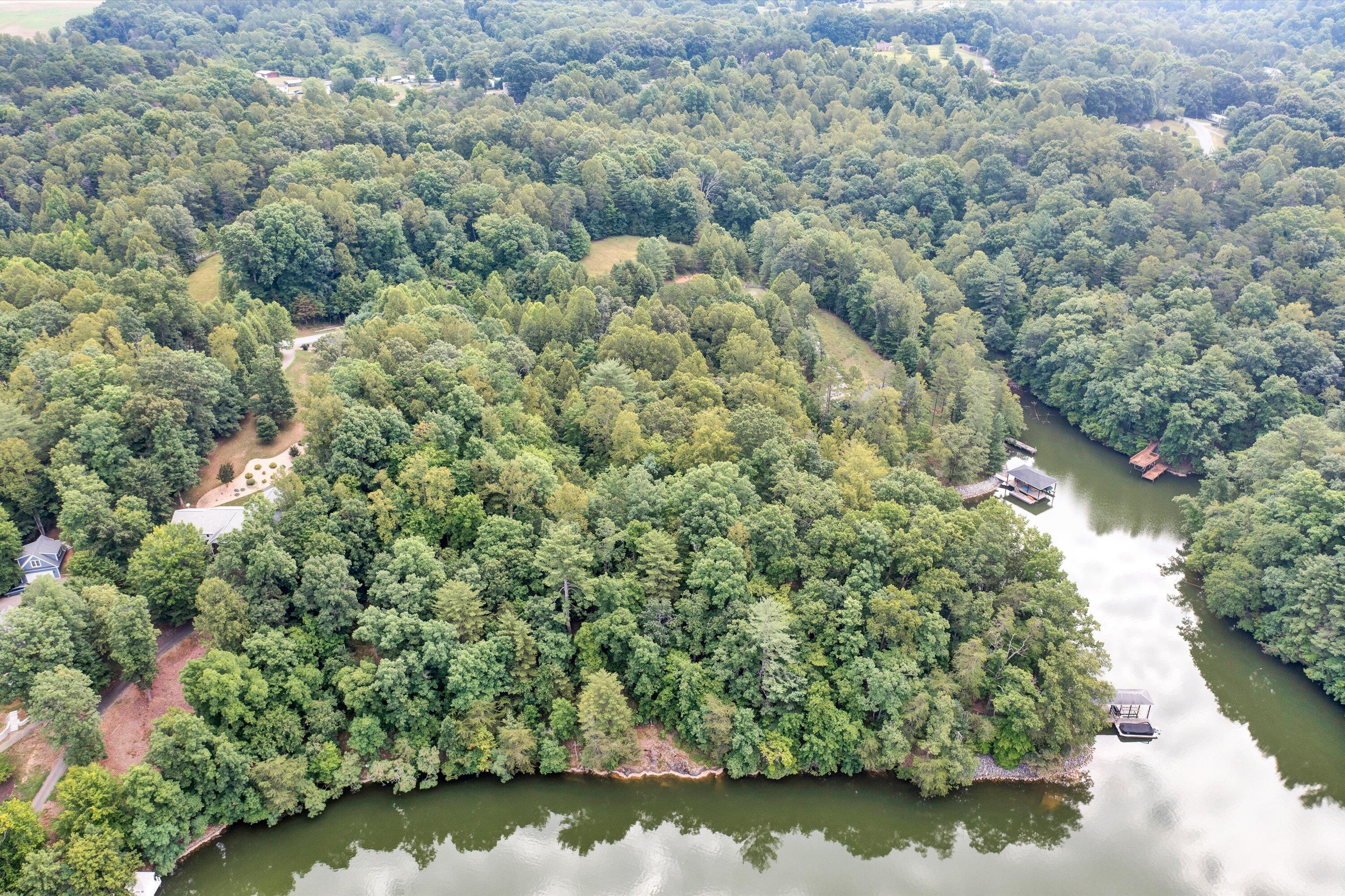 a view of a lake with trees