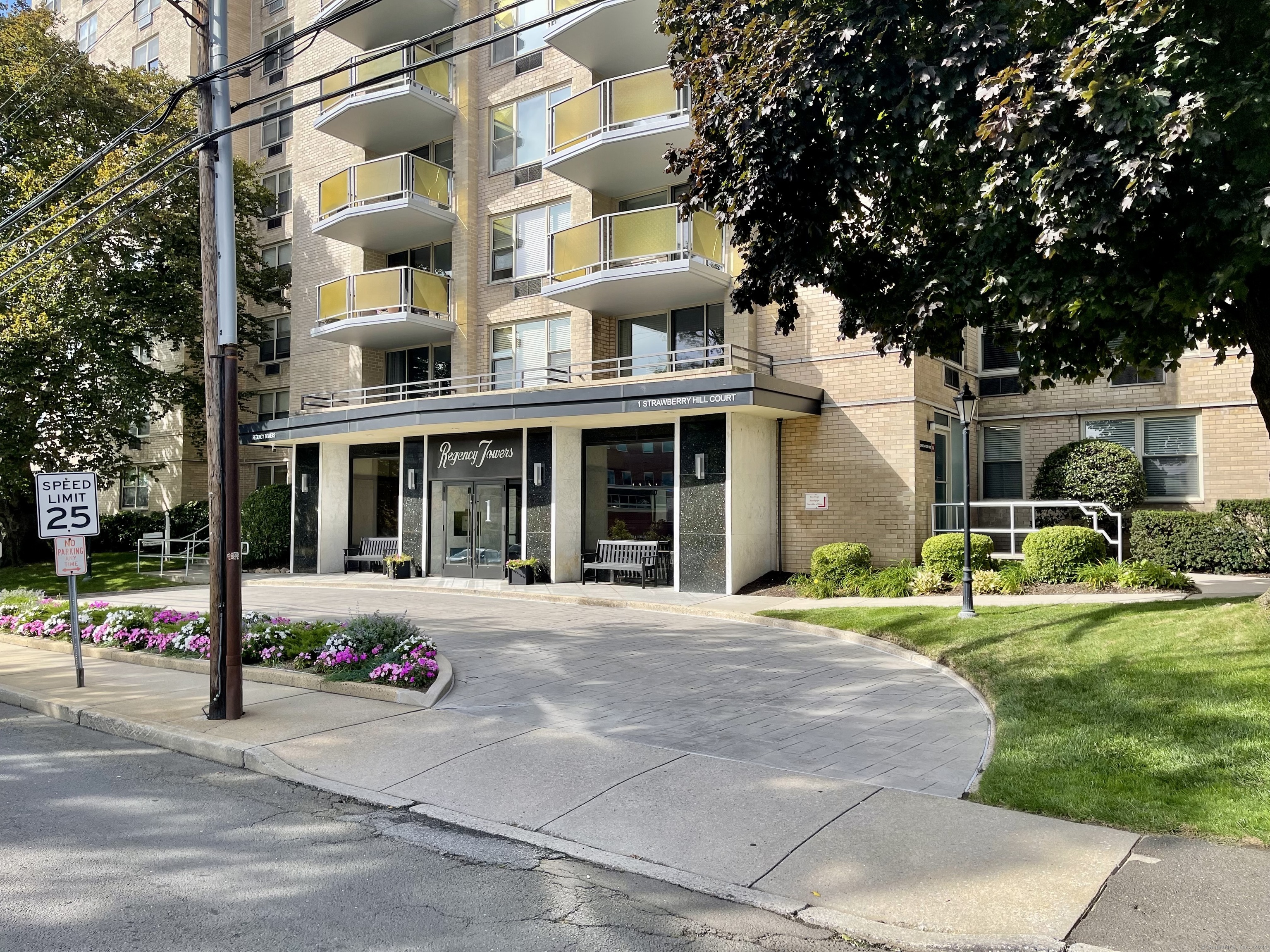 a view of a building with a yard