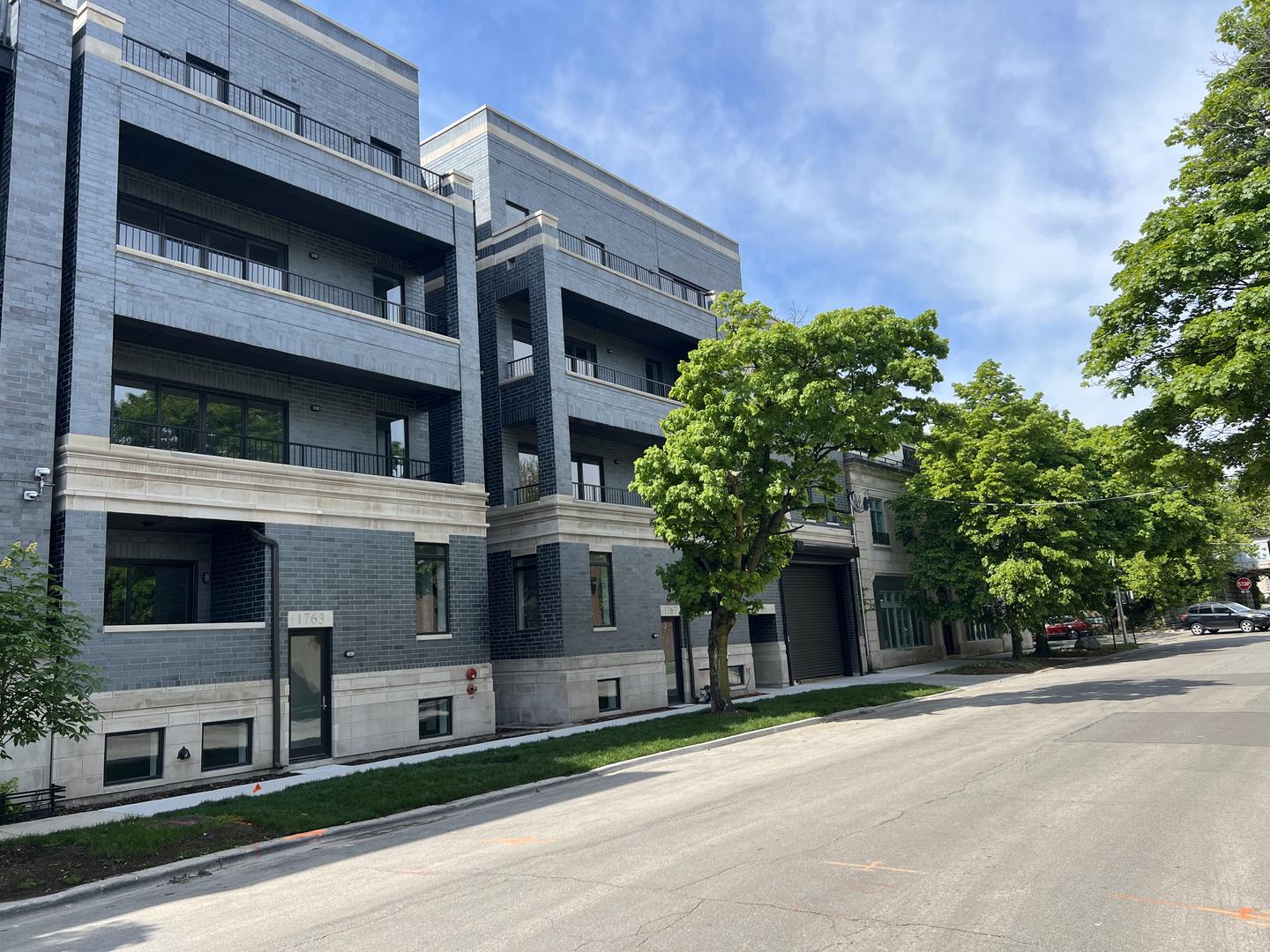 a view of a building with a street