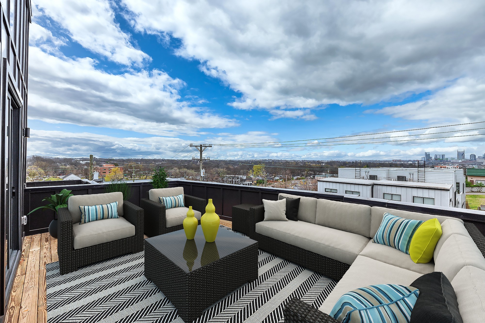 an outdoor living room with furniture