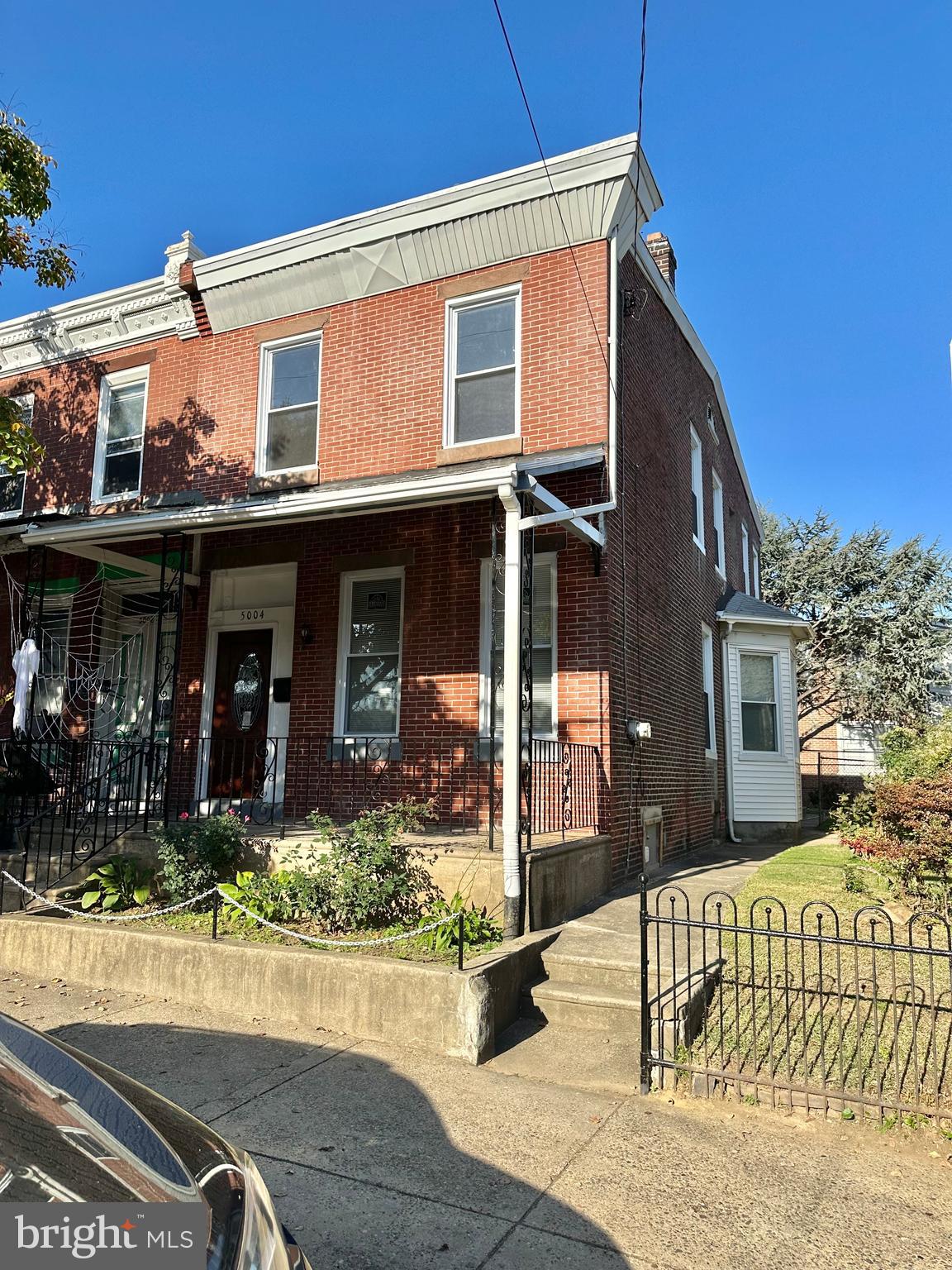 front view of a house with a street