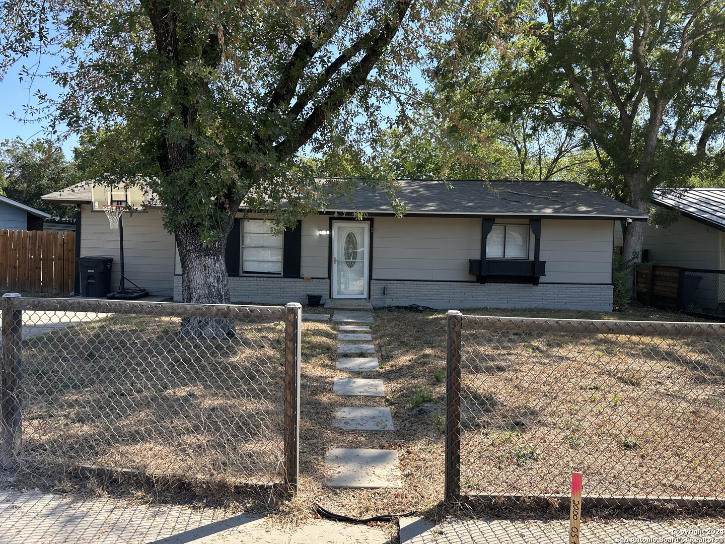 a front view of house with street