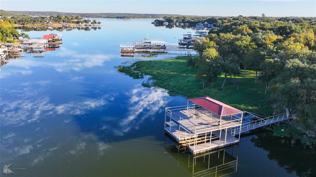 a wooden deck with lake view