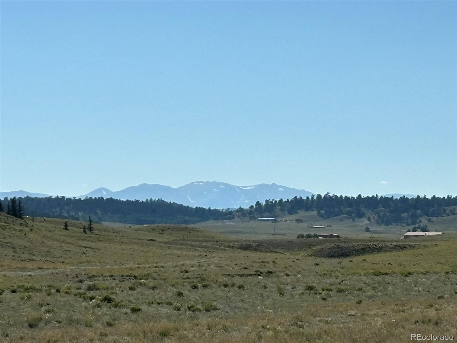 a view of a lake with a mountain in the background