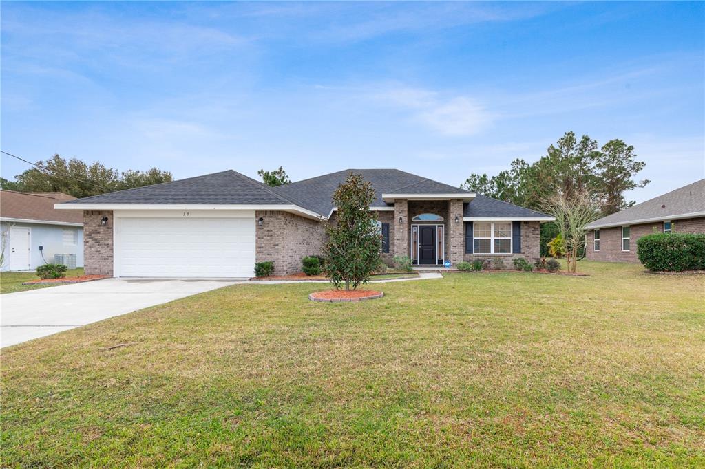 front view of a house with a yard