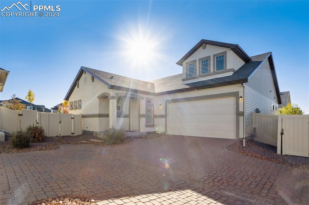 a view of a house with a garage