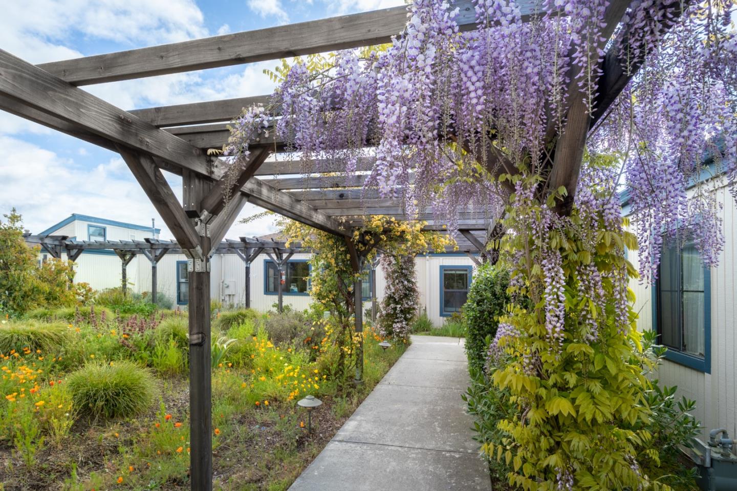 a entryway view with garden