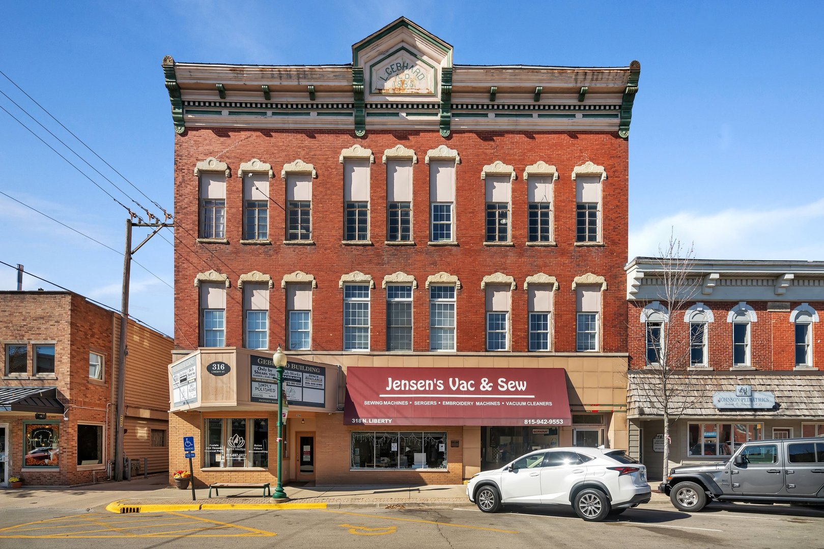 a view of a building with a street