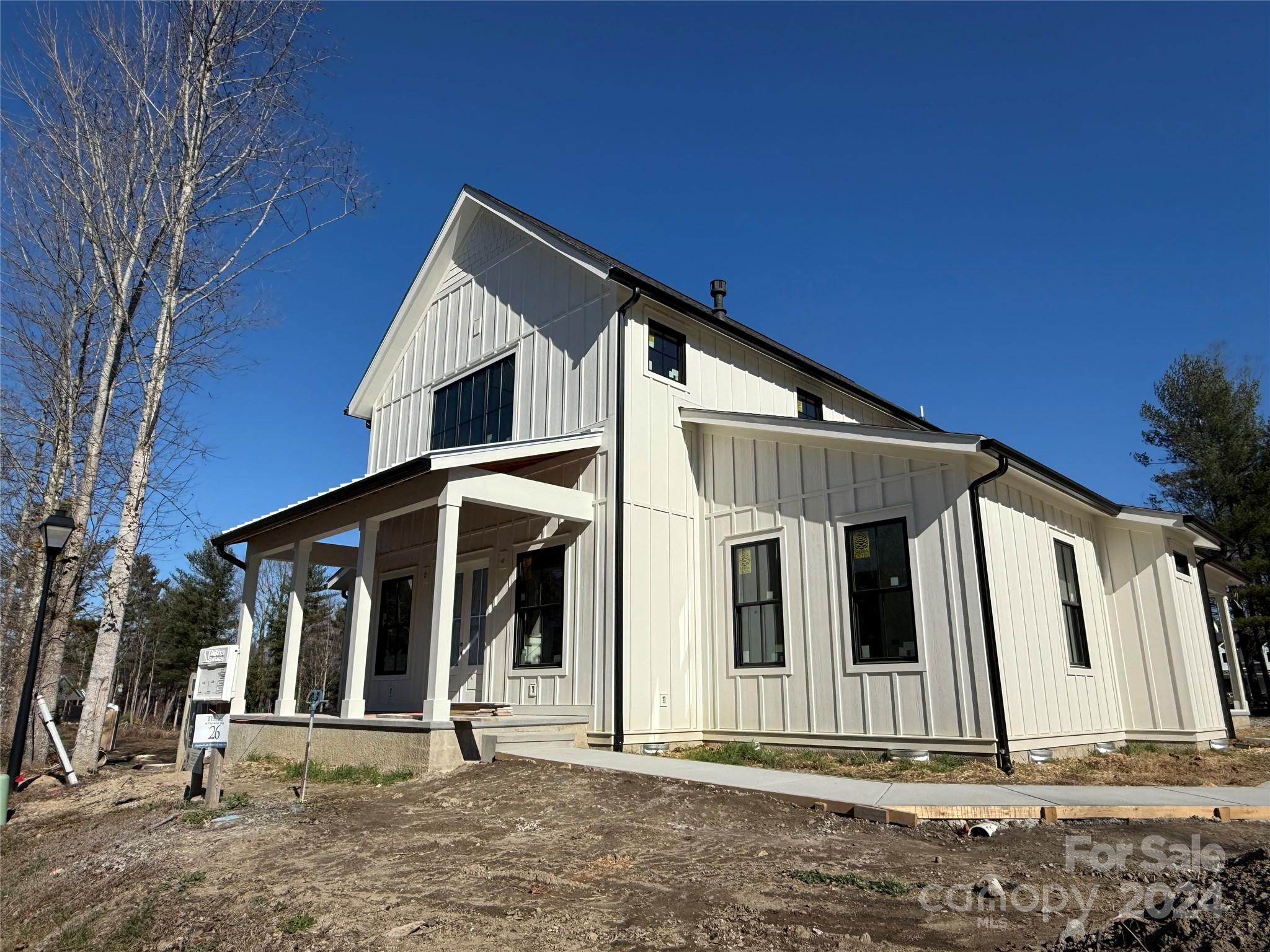 a front view of a house with a porch