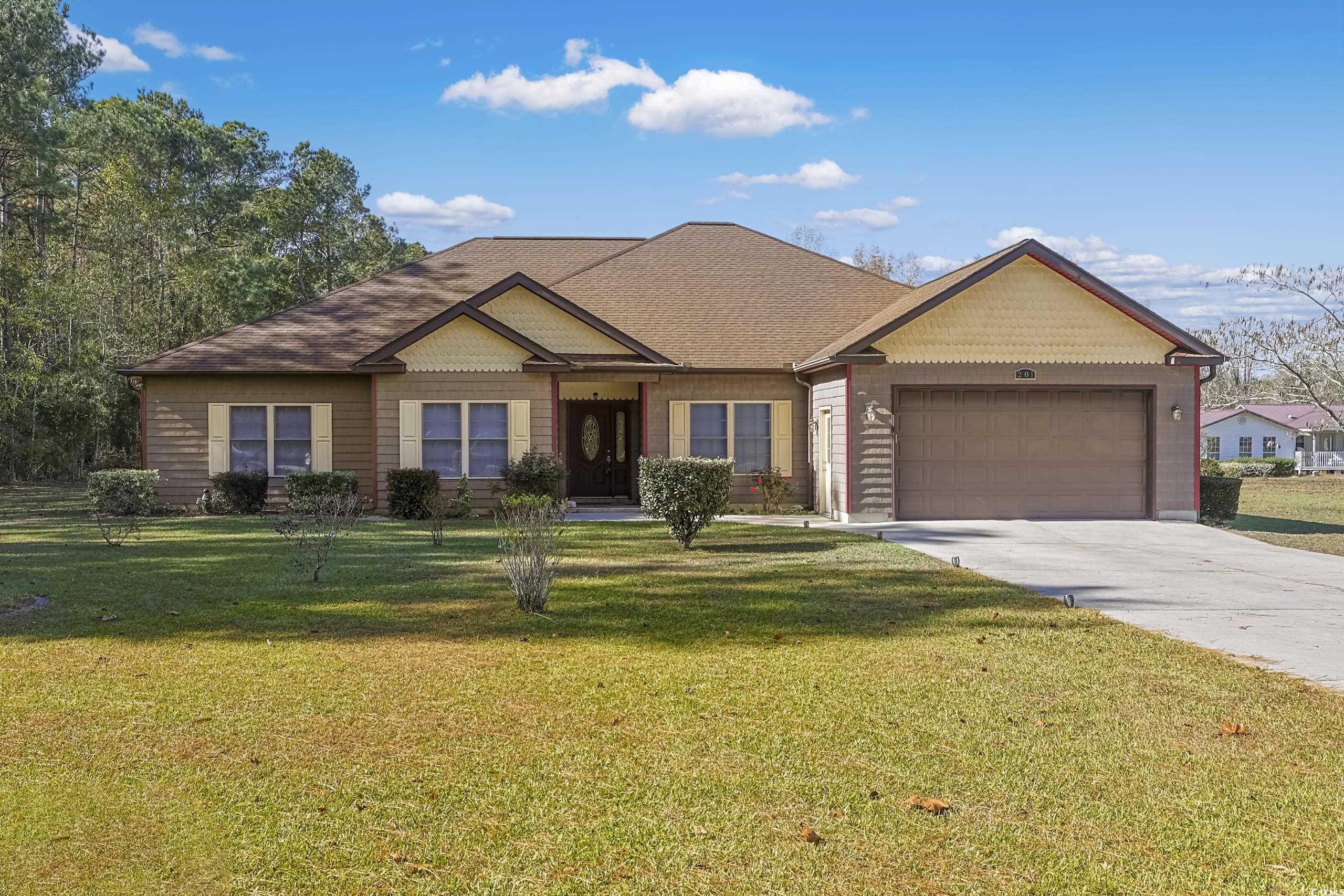 View of front of home featuring a front lawn