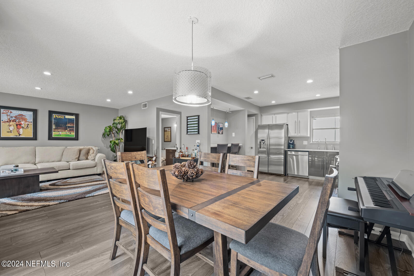 a view of a dining room with furniture