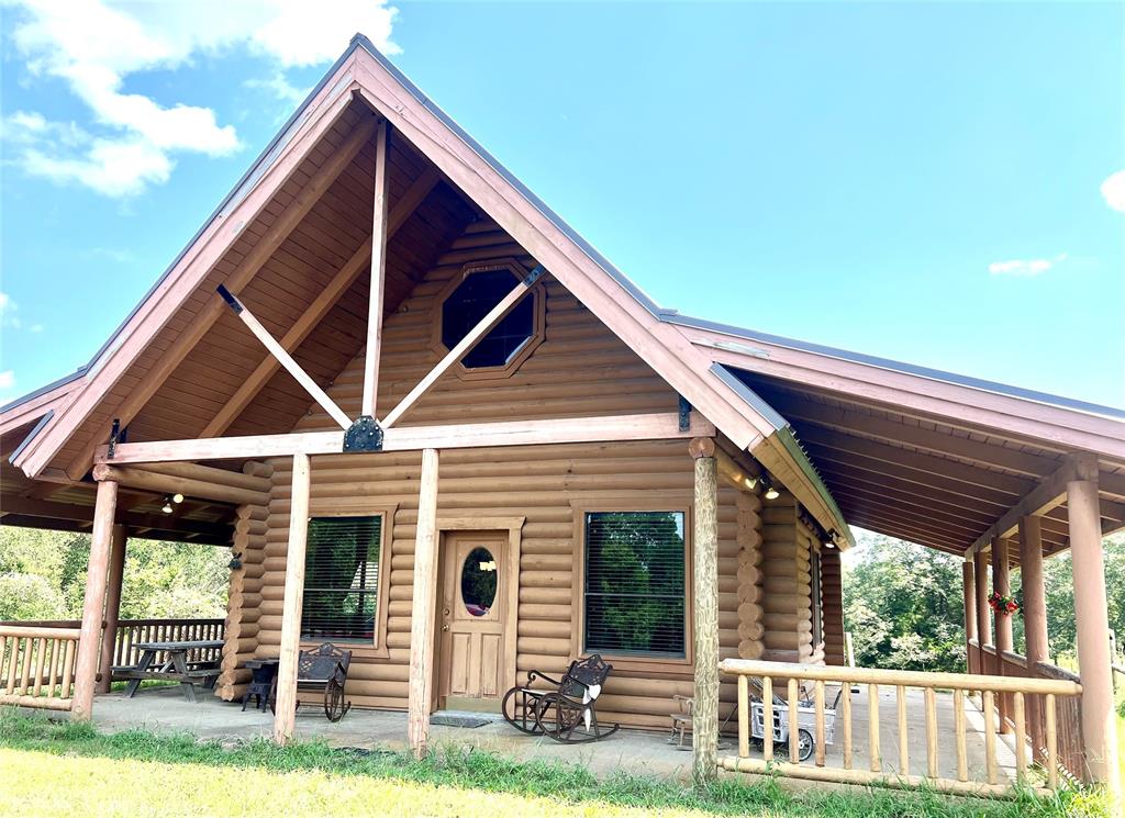 a front view of a house with porch