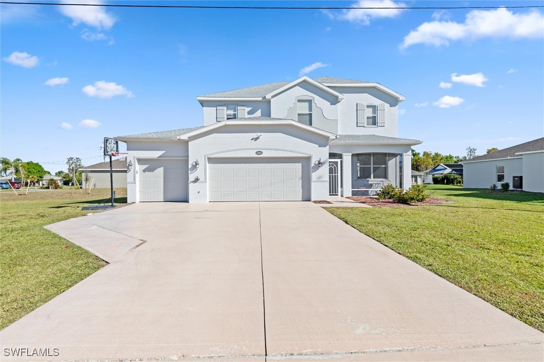 a front view of a house with a yard