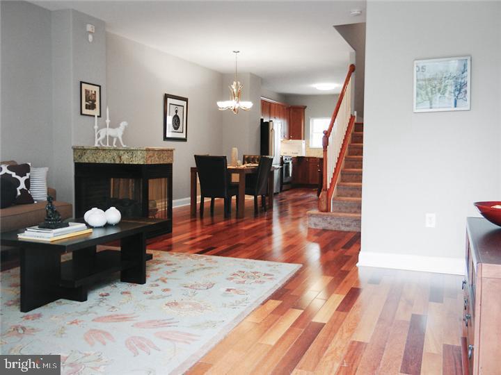 a view of a living room and dining room