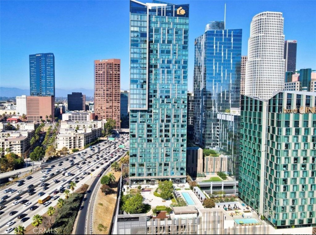 a view of city with tall buildings