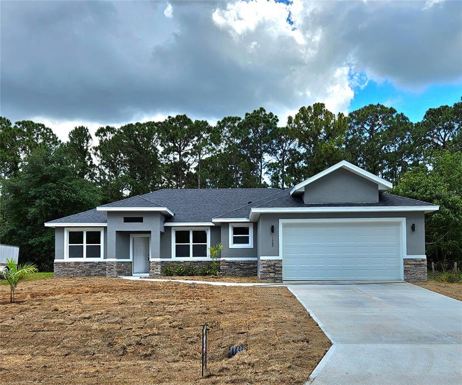 front view of a house with a yard