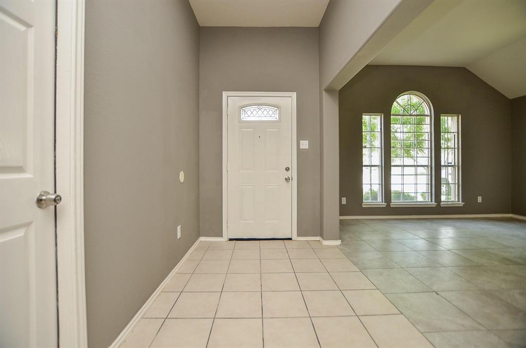 a view of empty room with windows