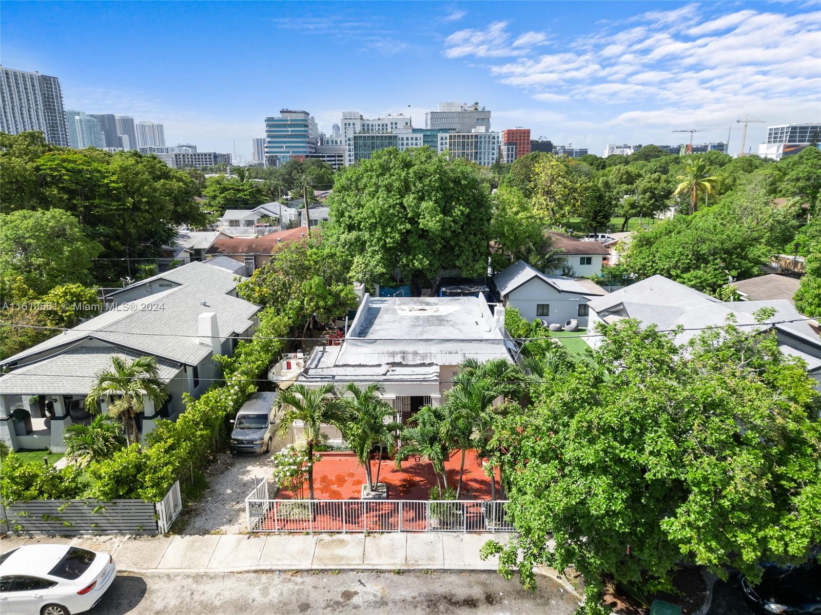 an aerial view of a house with a garden