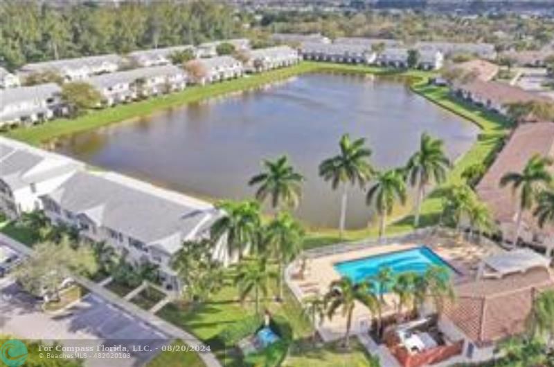 an aerial view of a houses with outdoor space