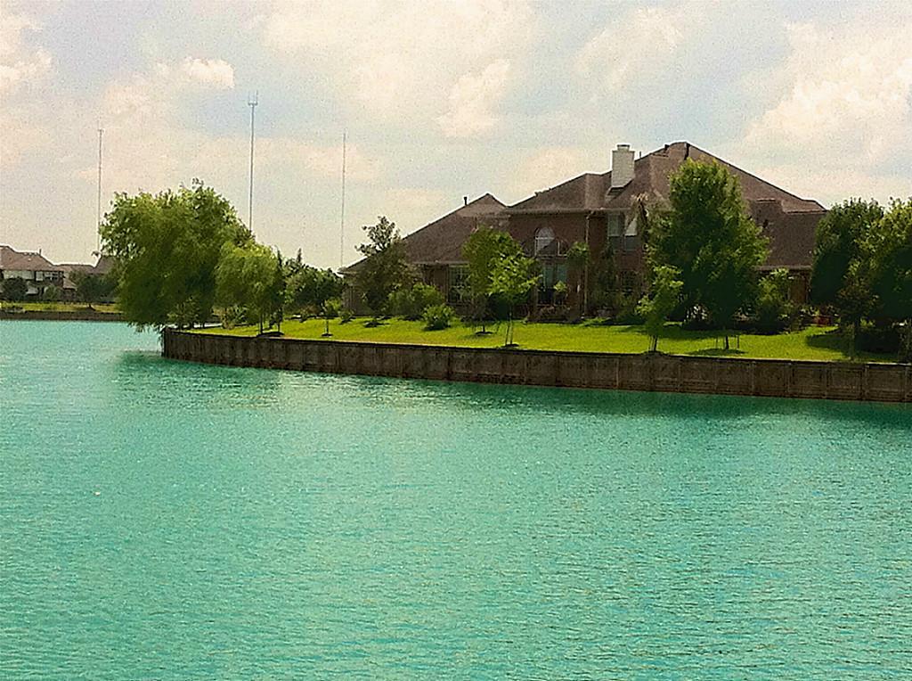 6802 Spanish Bay - 1/3 acre lake front lot on about 40 acres of living water lake.