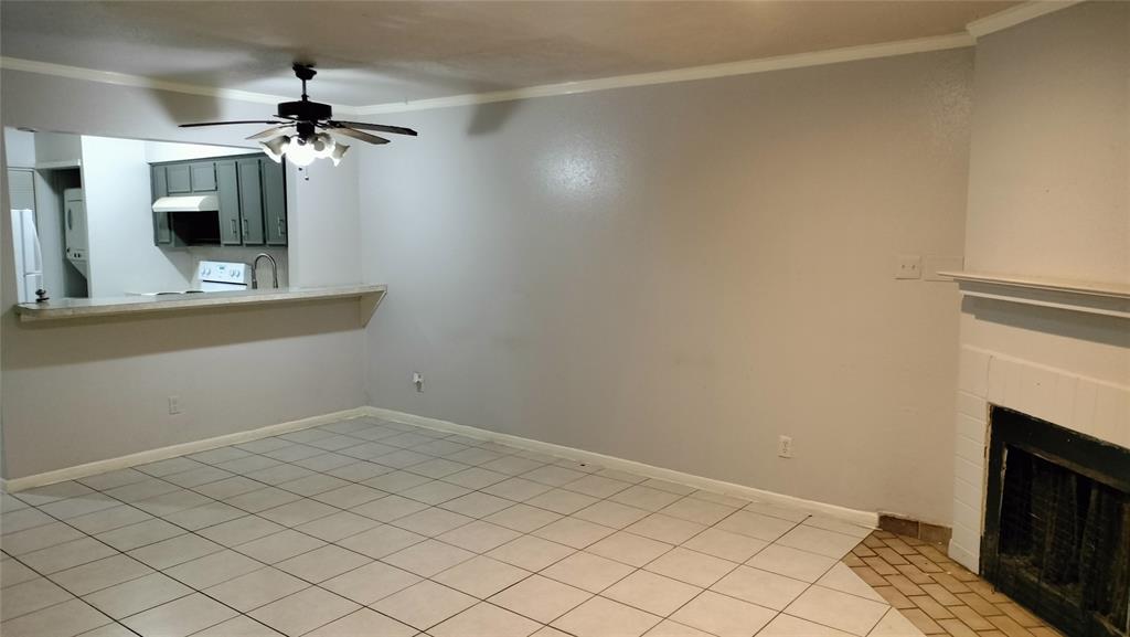 a view of a livingroom with a fireplace