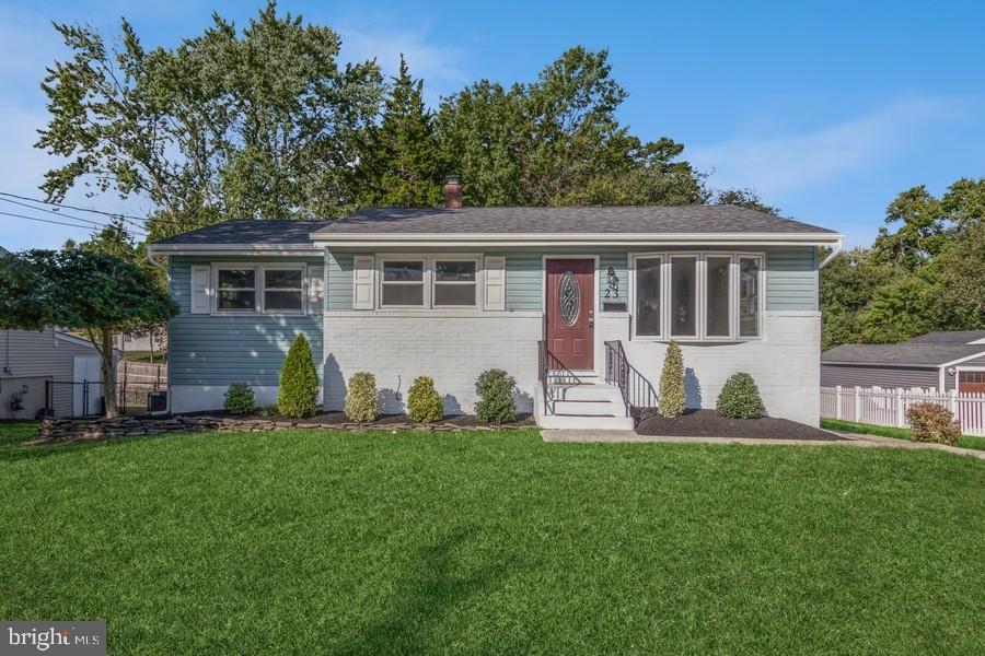 a house that has tree in front of it