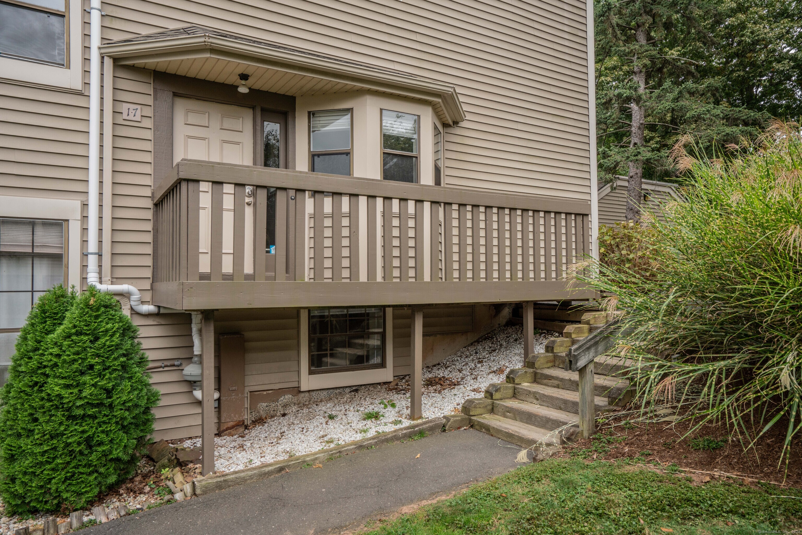 a front view of a house with garage