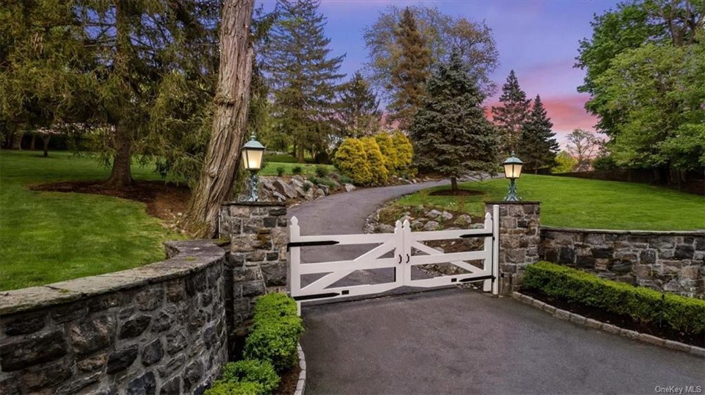 a view of a wooden door and a yard