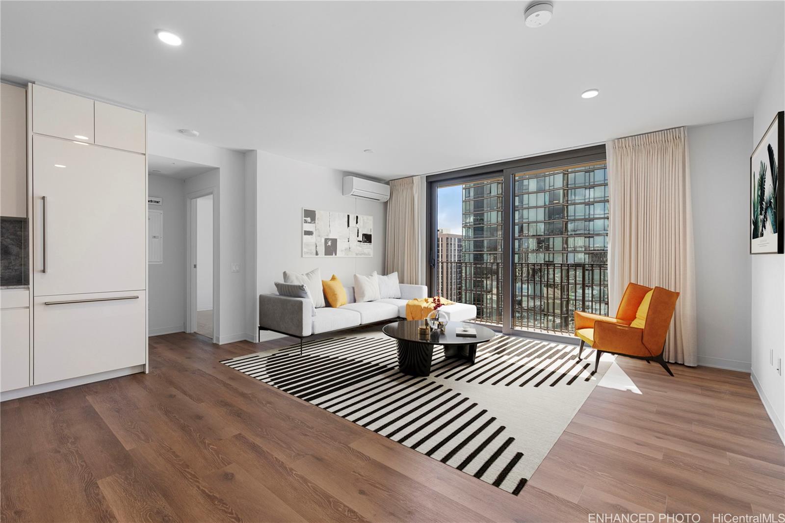 a bedroom with furniture and wooden floor