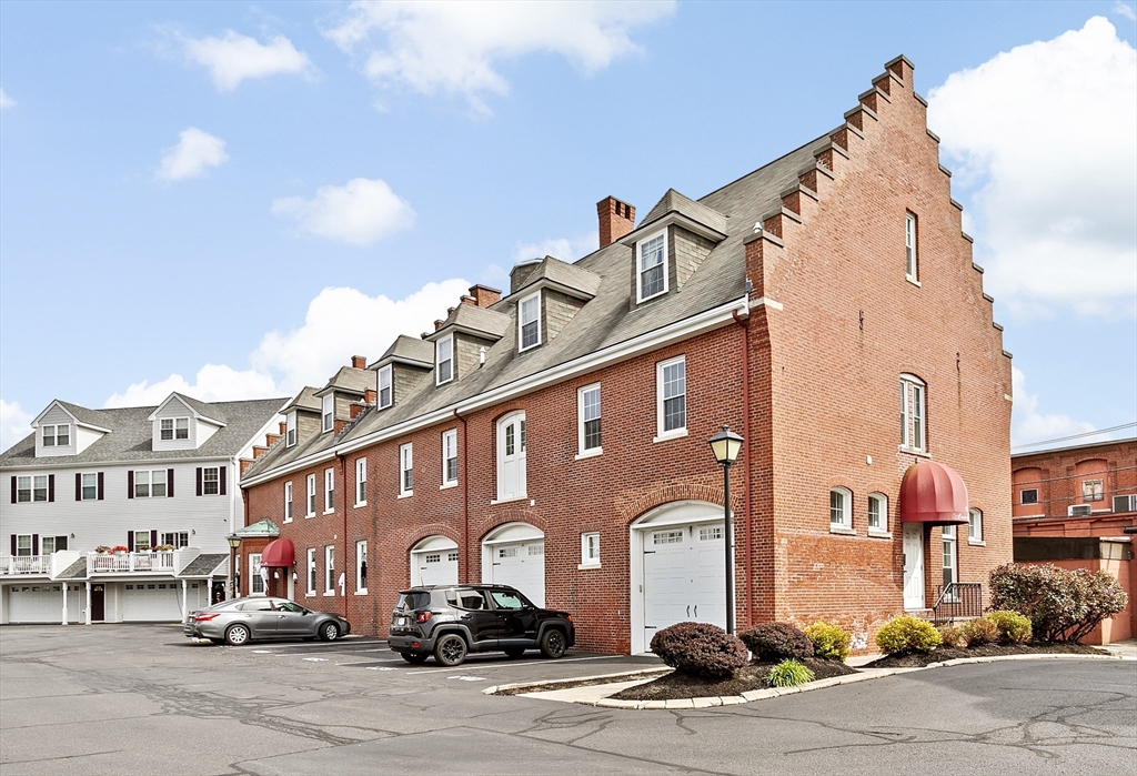 a front view of a building with street view