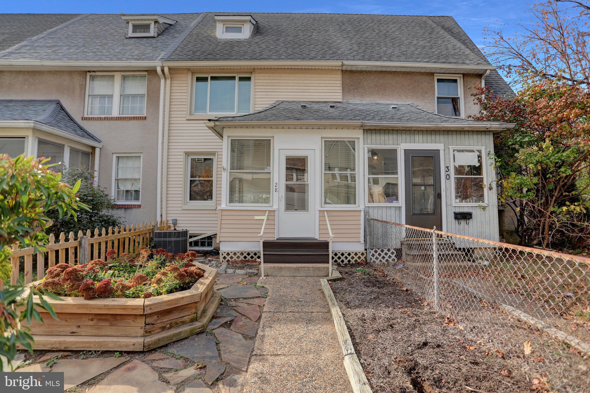 a front view of a house with entertaining space