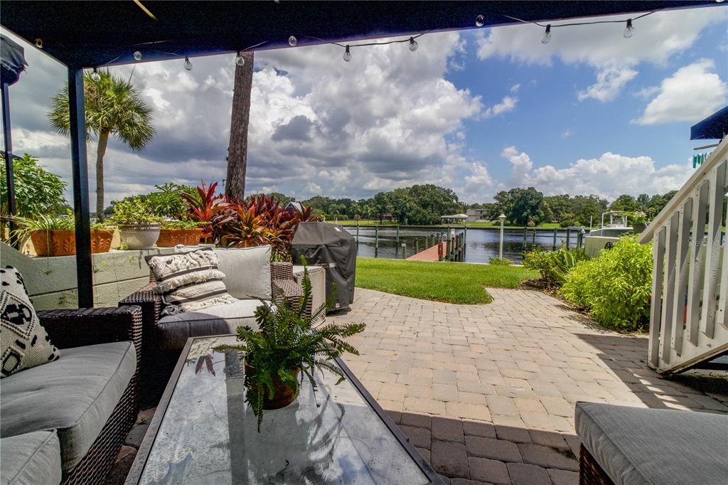 a view of a swimming pool with a patio