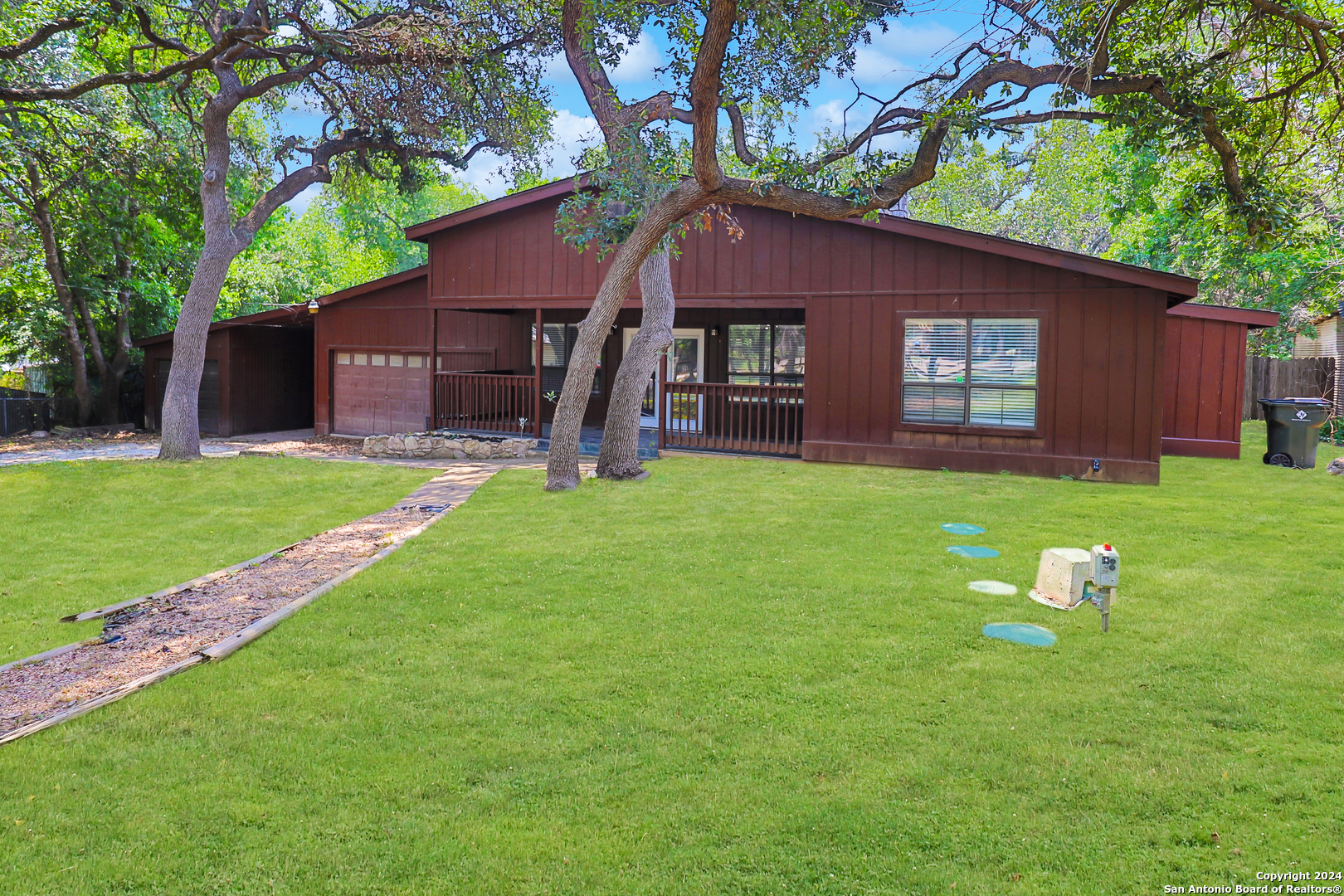 a backyard of a house with seating space