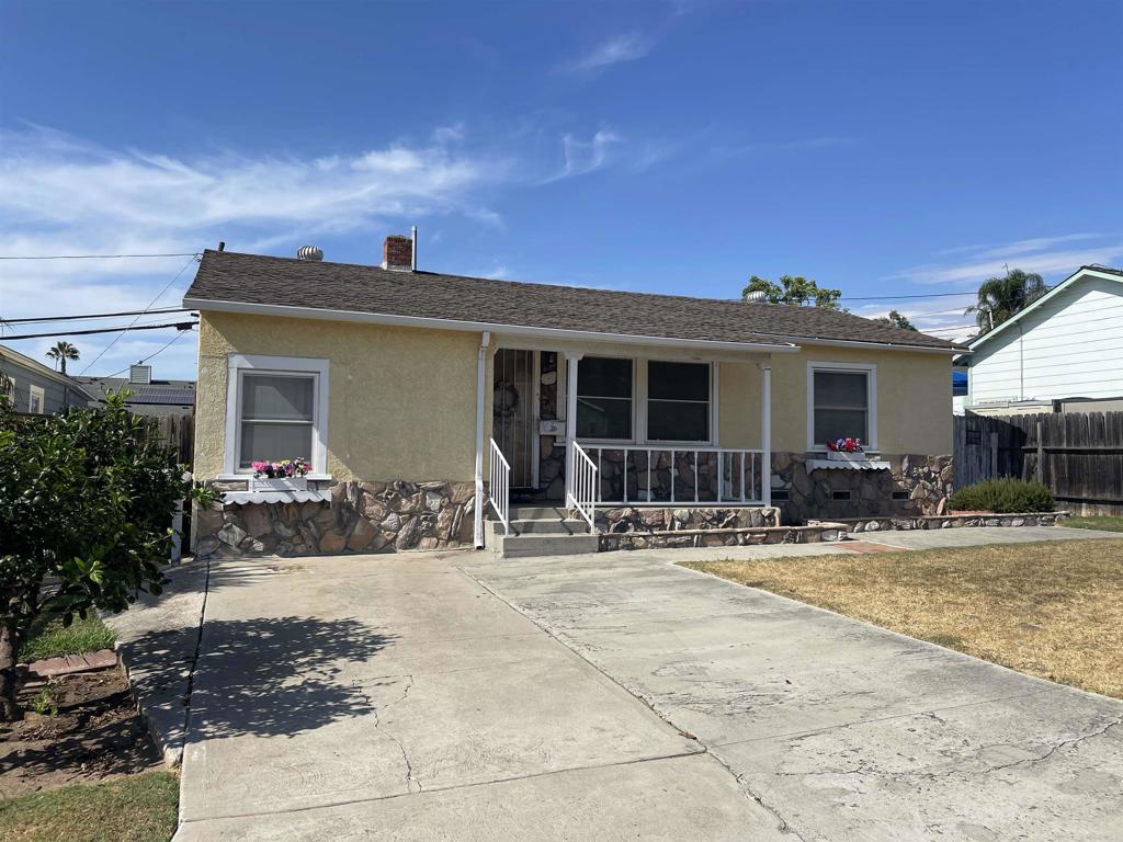 a front view of a house with a patio