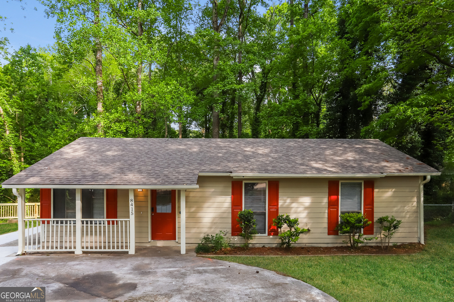 front view of a house with a yard