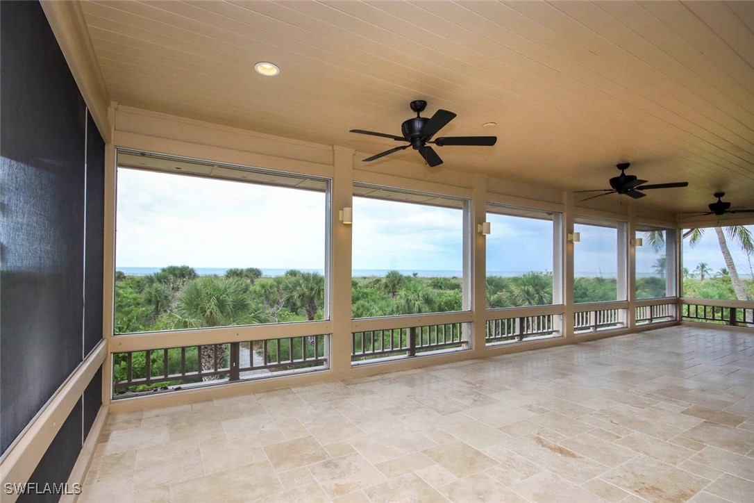 a view of an empty room with a large window