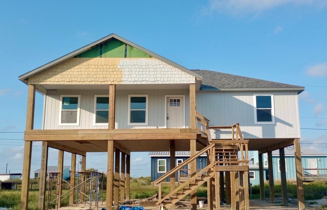 a front view of a house with a porch