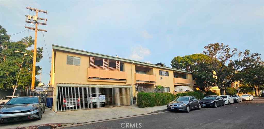 a view of a car park in front of house