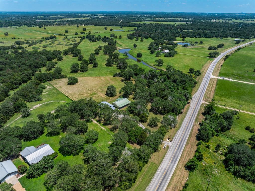 an aerial view of a golf course with outdoor space