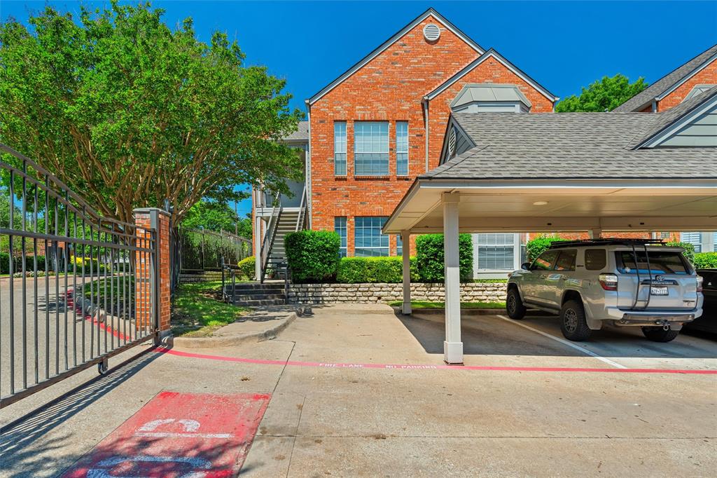 a view of a car parked in front of a house