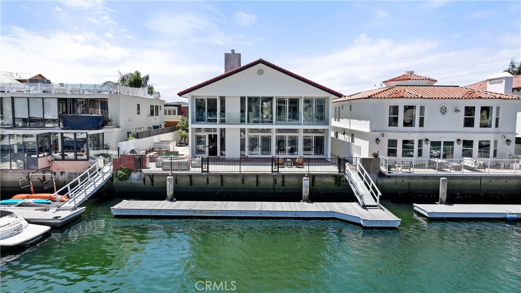 a front view of a house with swimming pool