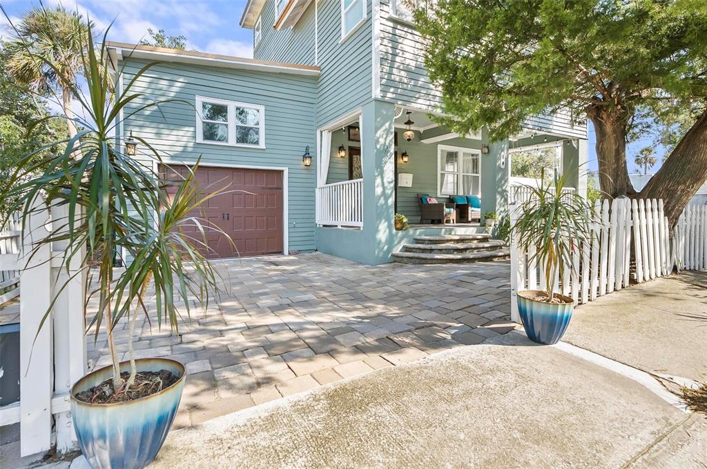 a front view of a house with a patio