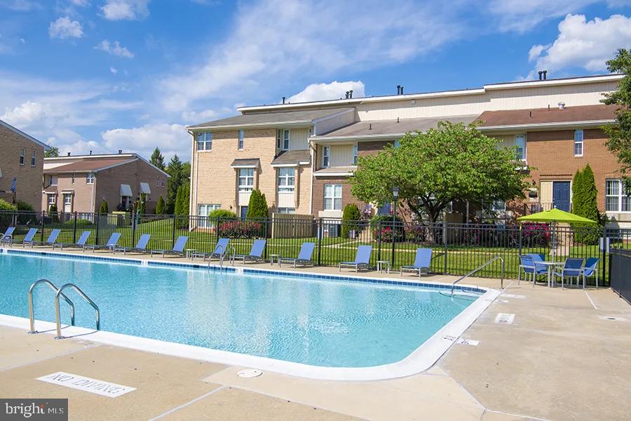 a view of a house with a swimming pool